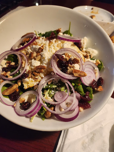 Fresh salad with nuts and cheese